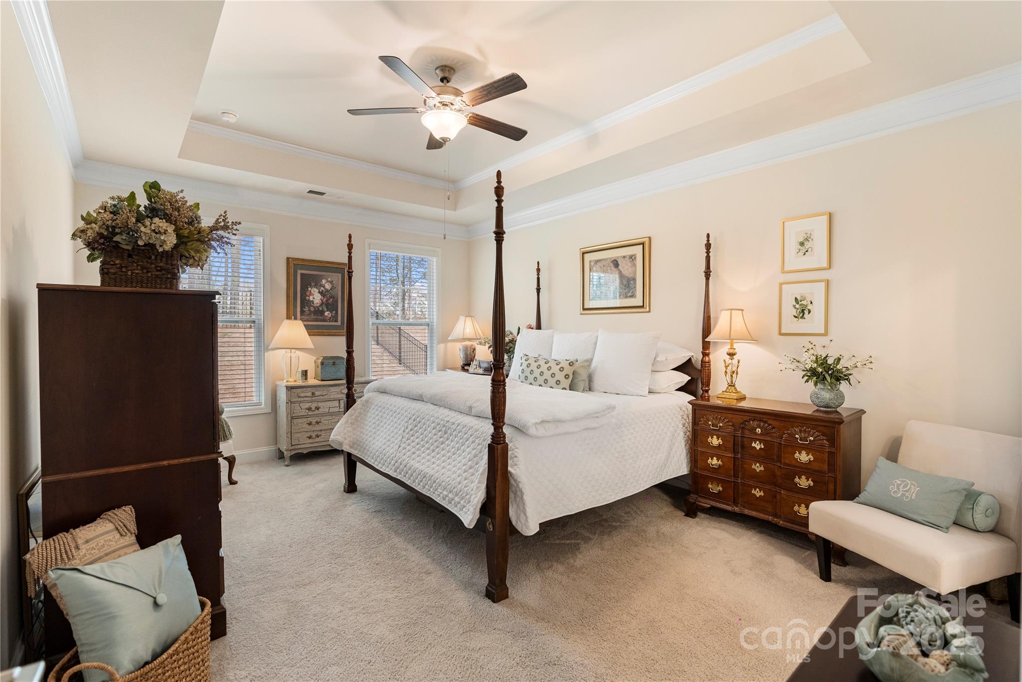 141 Rhuidean Court Troutman, NC 28166 - Photo 18 of 29 a bedroom with a bed mirror and couch