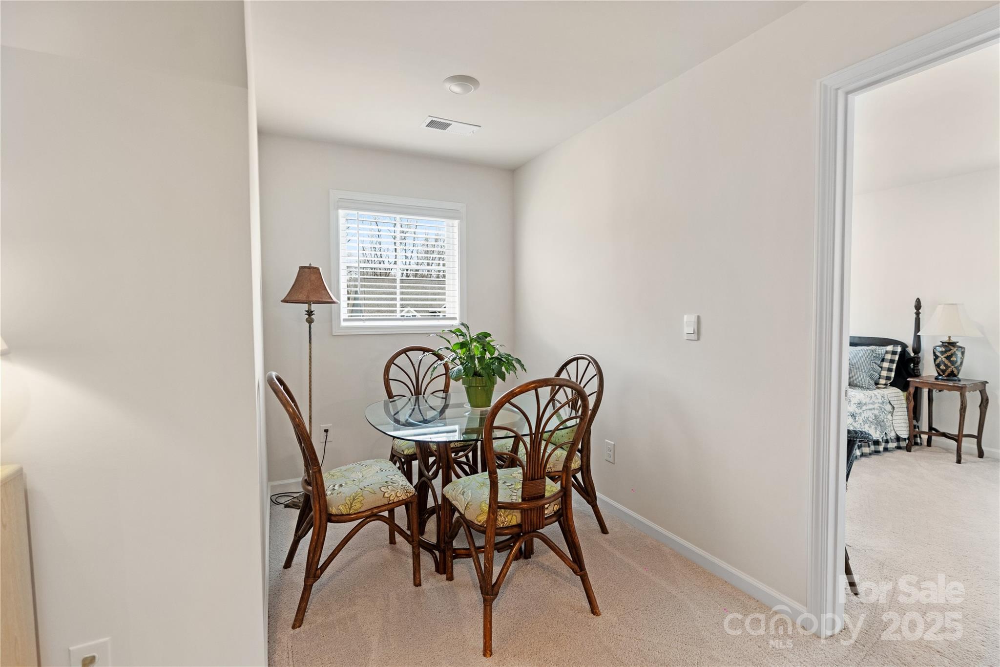 141 Rhuidean Court Troutman, NC 28166 - Photo 22 of 29 a view of a dining room with furniture and window