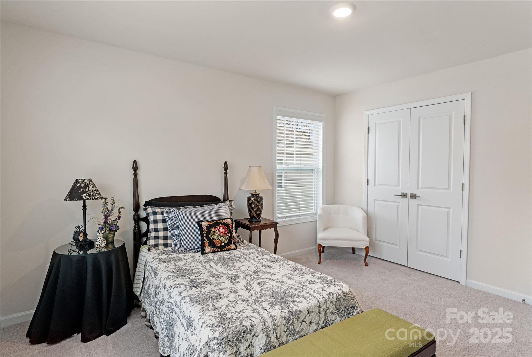 141 Rhuidean Court Troutman, NC 28166 - Photo 23 of 29 a living room with furniture and a window