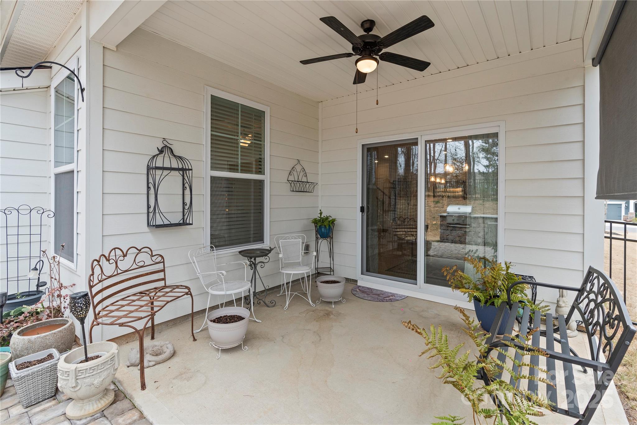 141 Rhuidean Court Troutman, NC 28166 - Photo 7 of 29 a living room with furniture and potted plant