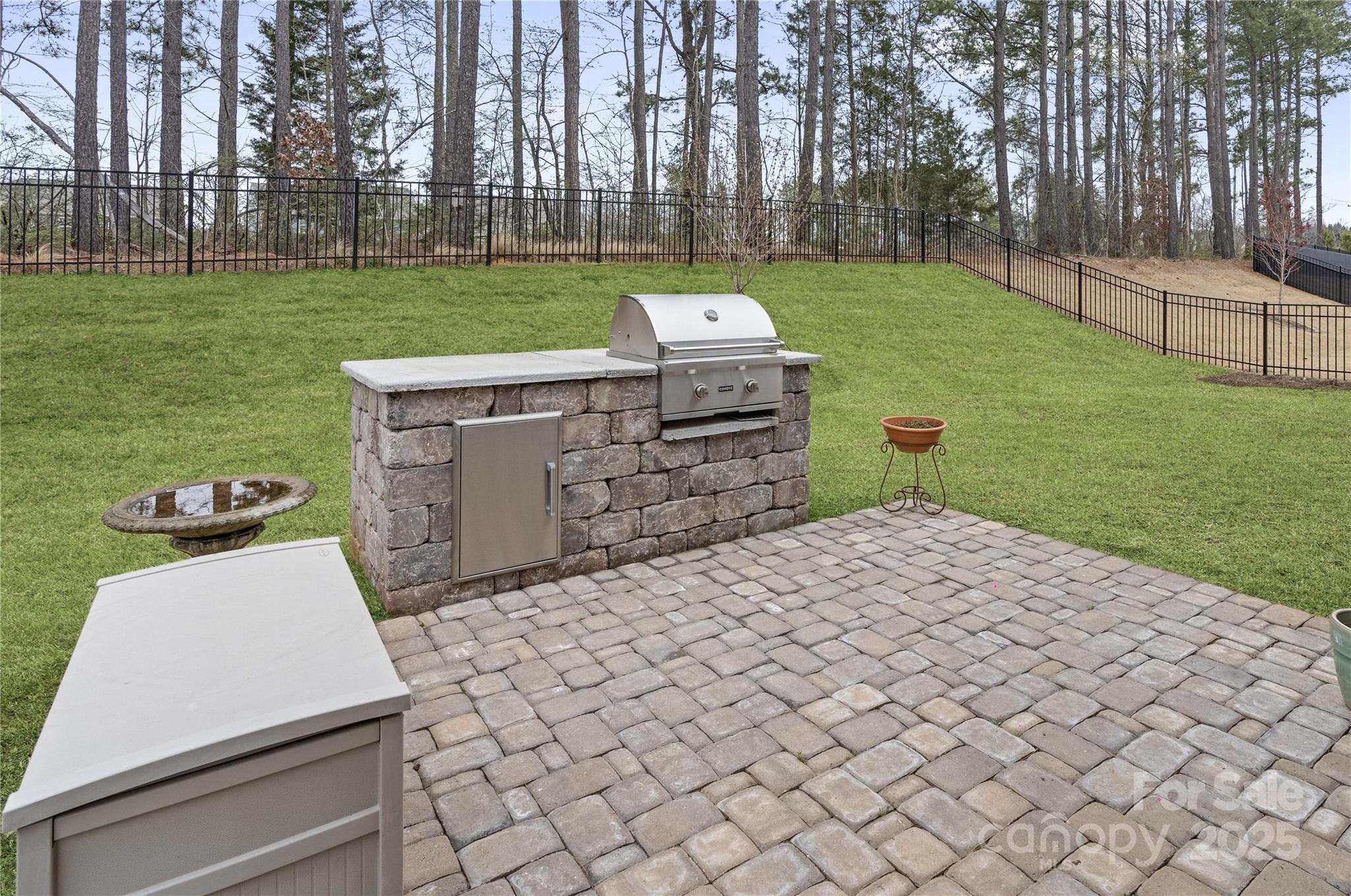 141 Rhuidean Court Troutman, NC 28166 - Photo 8 of 29 a view of a backyard with wooden floor