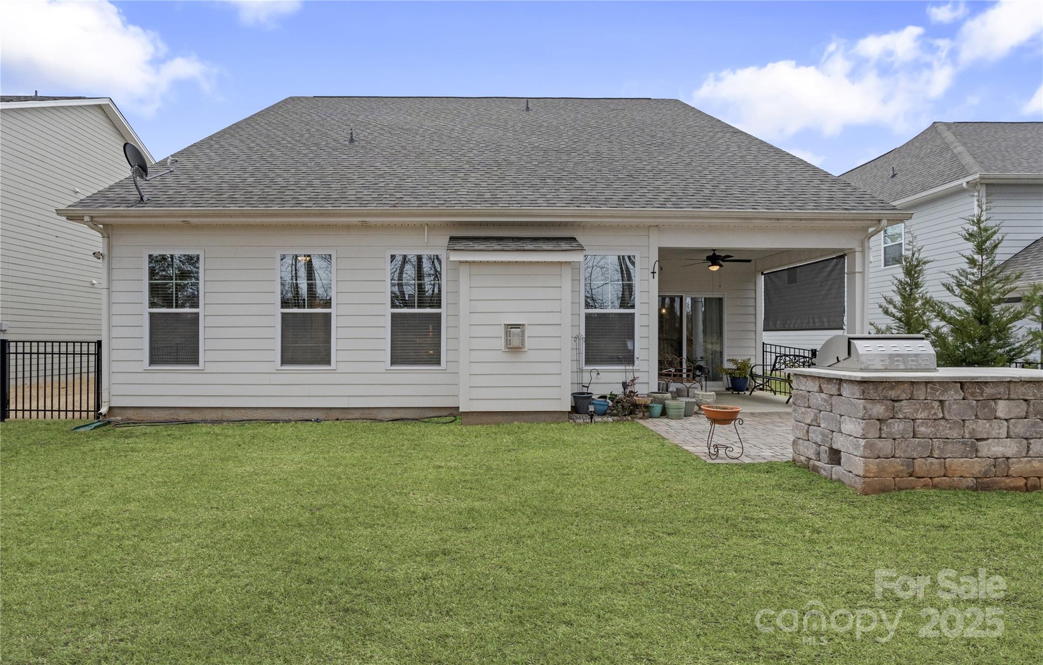 141 Rhuidean Court Troutman, NC 28166 - Photo 9 of 29 a view of a house with a yard and sitting area