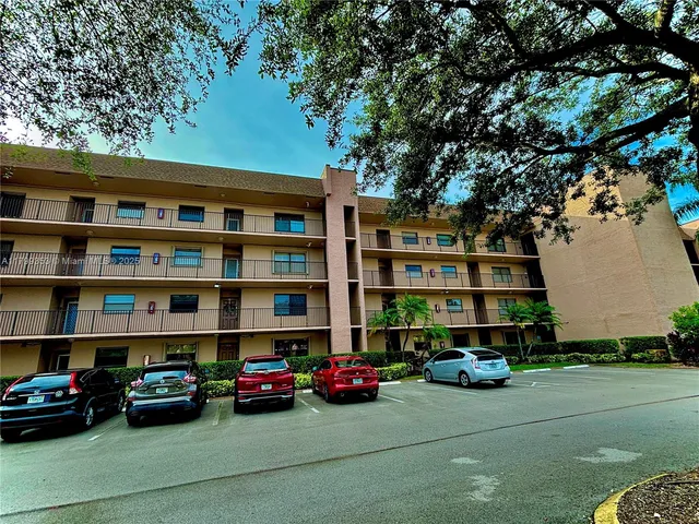 a cars parked in front of a building