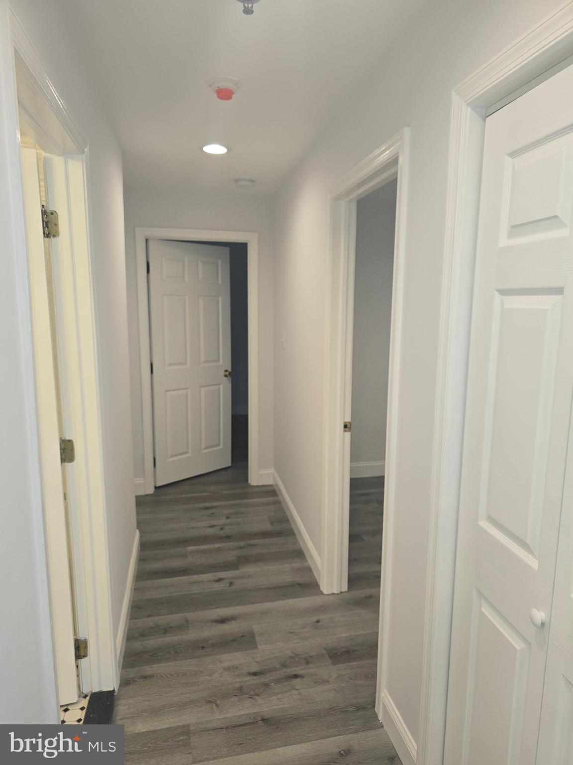 210 Shurs Lane, Unit 4 Philadelphia, PA 19128 - Photo 19 of 24 a view of a hallway with wooden floor