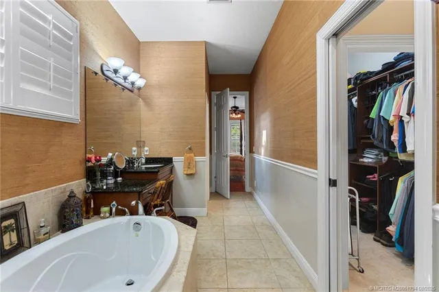 a bathroom with a bathtub and a sink