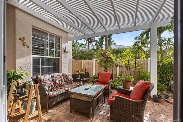 a outdoor living space with furniture and garden view