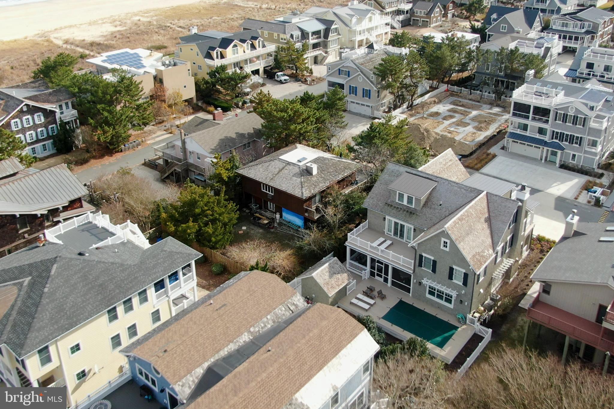 39859 Collins Road Bethany Beach, DE 19930 - Photo 6 of 8 Surrounded by fine custom homes.