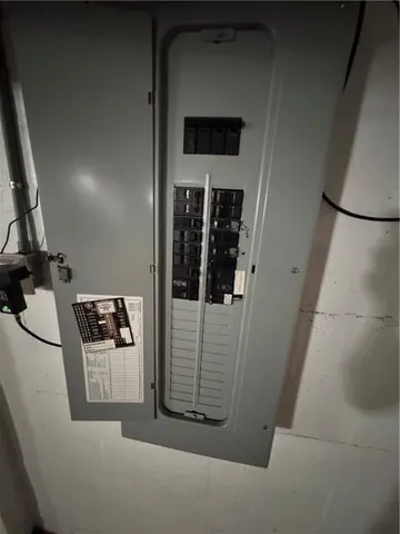 a view of a big room with wooden walls