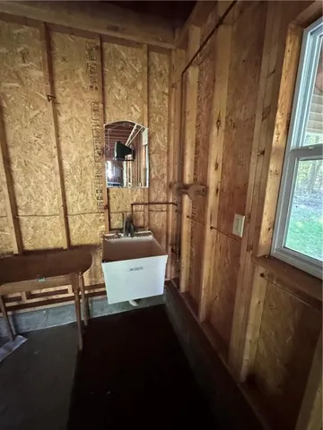 a view of a house with swimming pool and yard