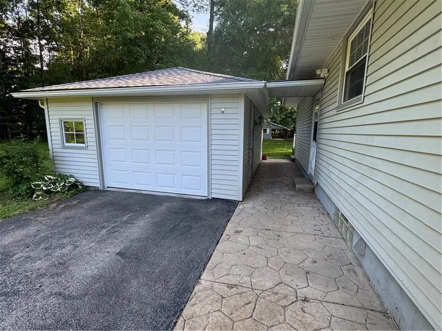 a view of a back yard of the house