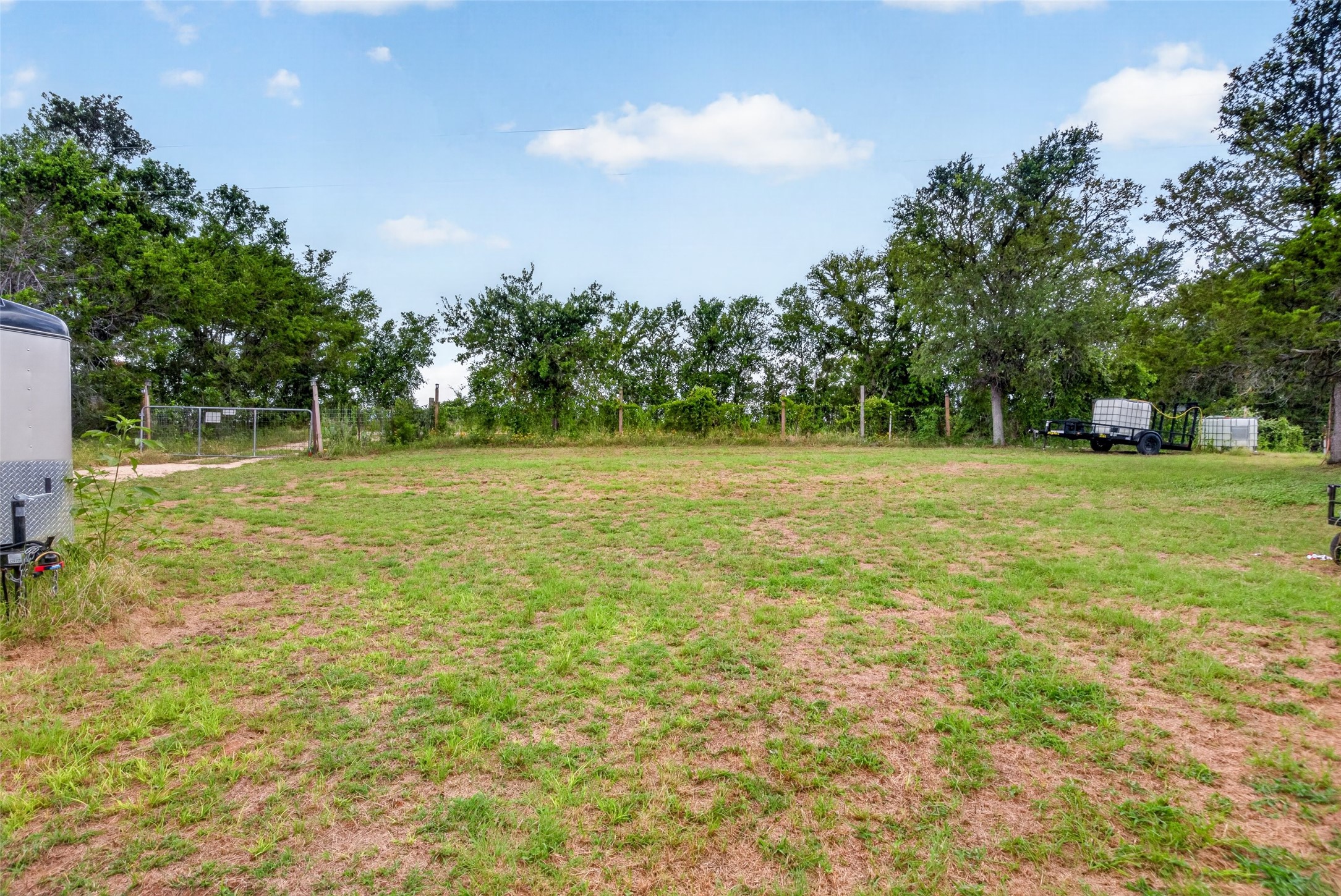 266 Beaver Road Elgin, TX 78621 - Photo 6 of 40 Existing water storage tank conveys with the property, adding value and functionality for future development or homestead use.