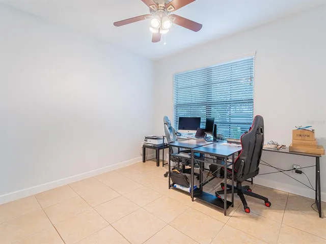 a workspace with furniture and window