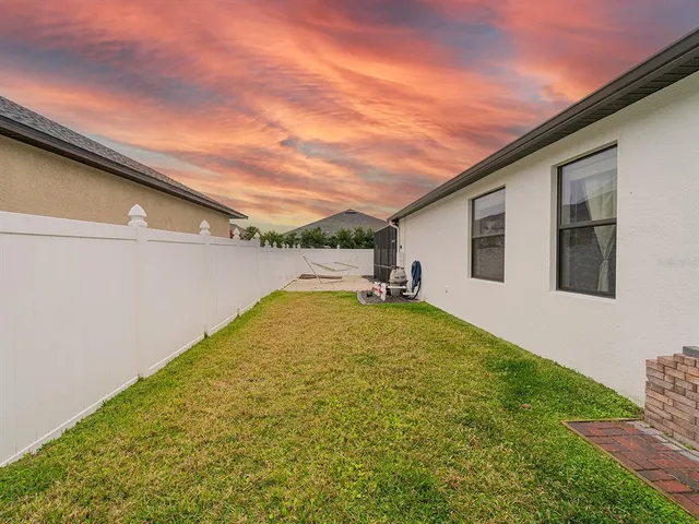 a view of a backyard with a garden