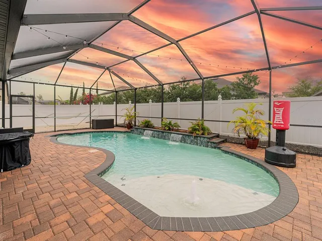 a terrace with a table and chairs