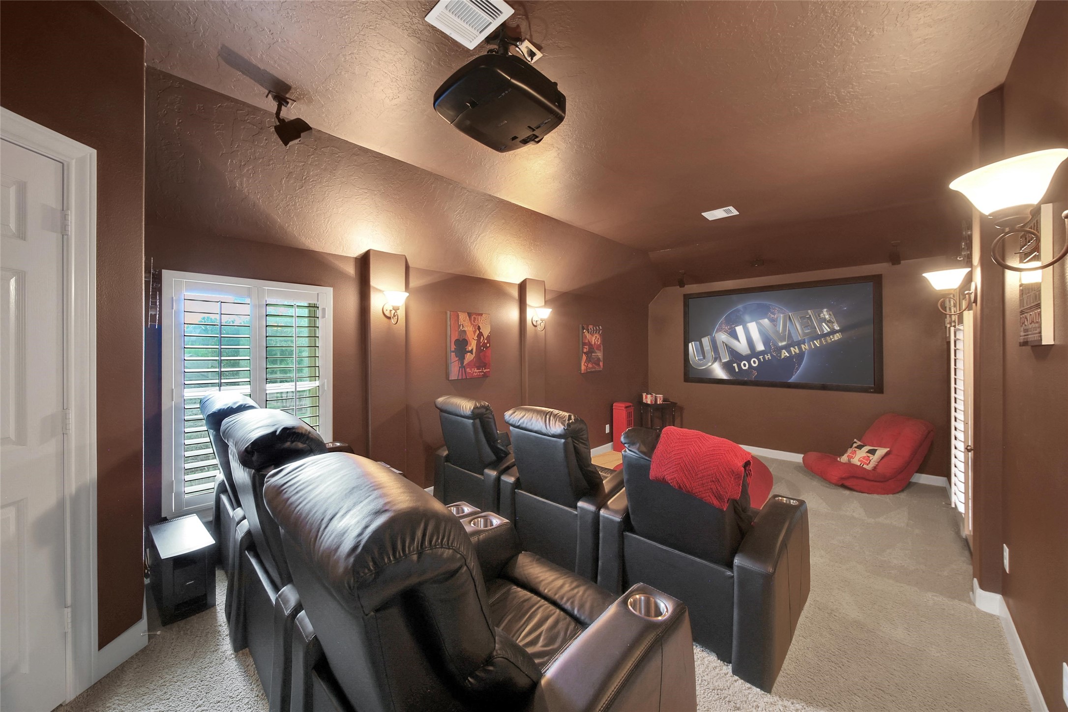 5902 Royal Hill Court Kingwood, TX 77345 - Photo 18 of 43 a living room with furniture and a flat screen tv