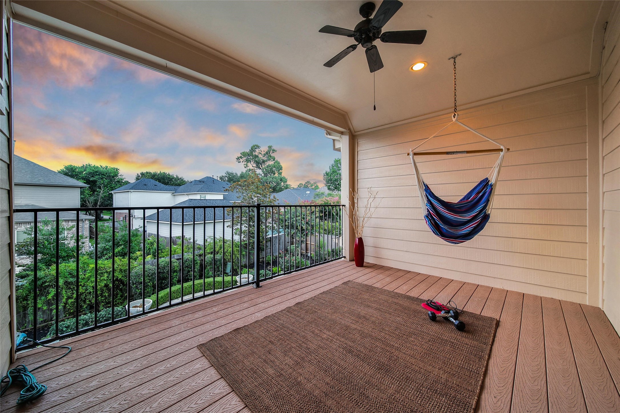 5902 Royal Hill Court Kingwood, TX 77345 - Photo 19 of 43 a view of a balcony with wooden floor