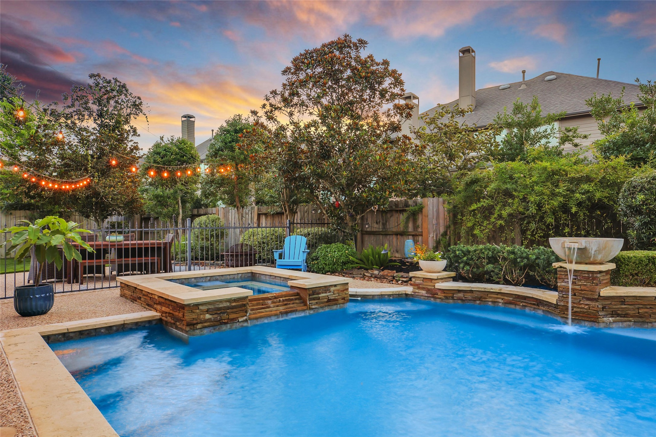 5902 Royal Hill Court Kingwood, TX 77345 - Photo 2 of 43 a outdoor space with pool table and chairs