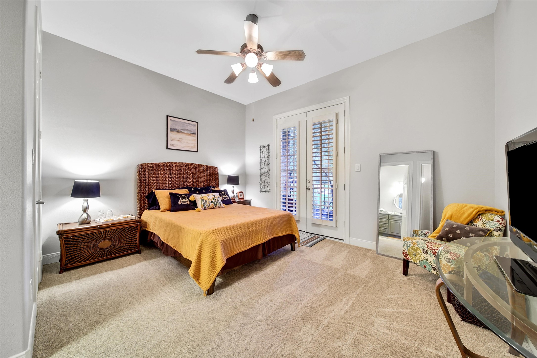 5902 Royal Hill Court Kingwood, TX 77345 - Photo 27 of 43 a bedroom with a bed and lamp