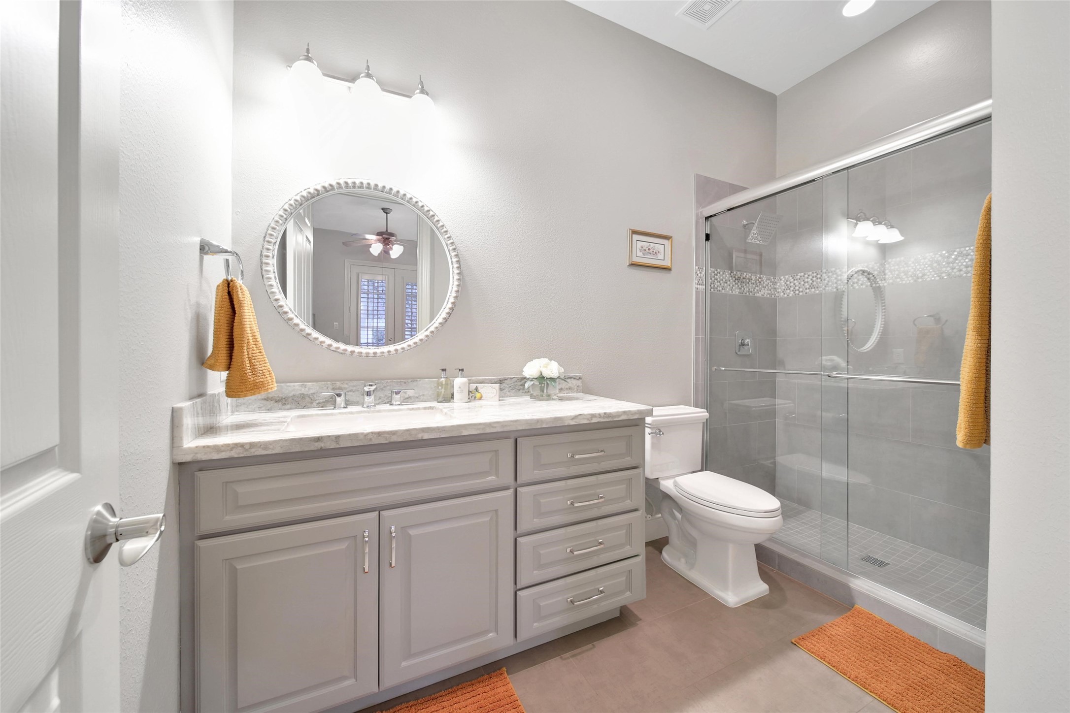 5902 Royal Hill Court Kingwood, TX 77345 - Photo 28 of 43 a bathroom with a sink a toilet and shower