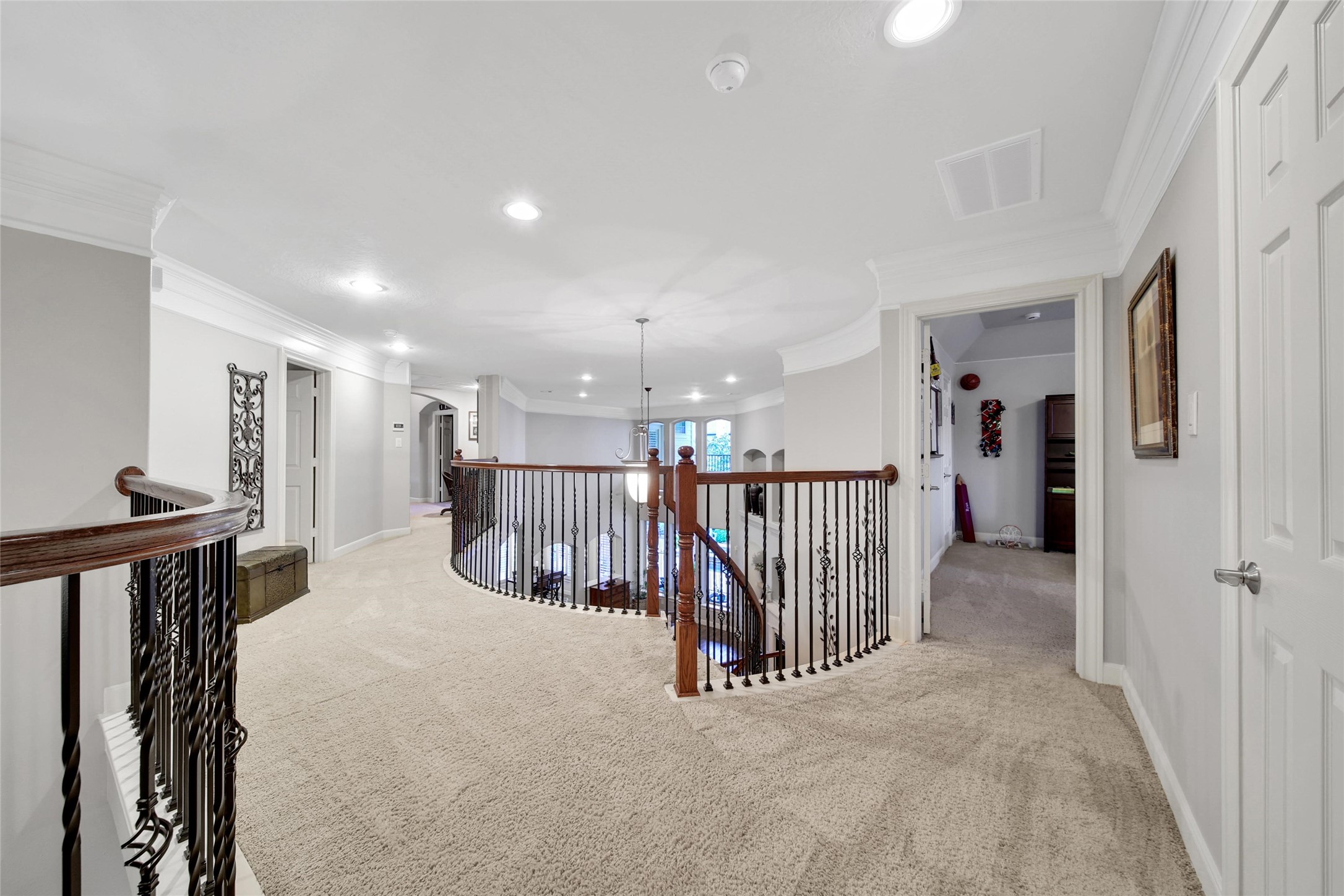 5902 Royal Hill Court Kingwood, TX 77345 - Photo 29 of 43 a view of a hallway with a furniture and staircase