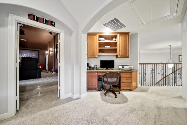 a view of a livingroom with furniture and windows