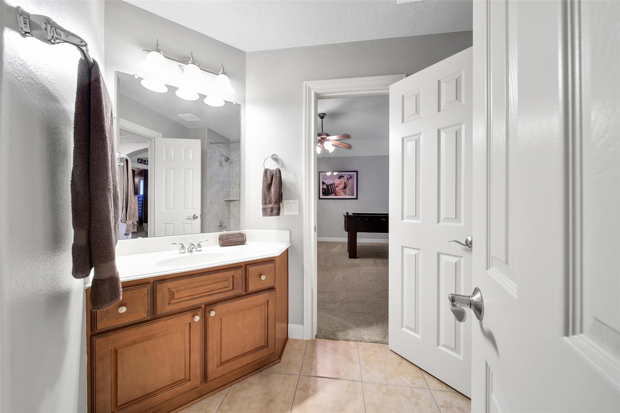 5902 Royal Hill Court Kingwood, TX 77345 - Photo 37 of 43 a spacious bathroom with a double vanity sink a mirror and shower
