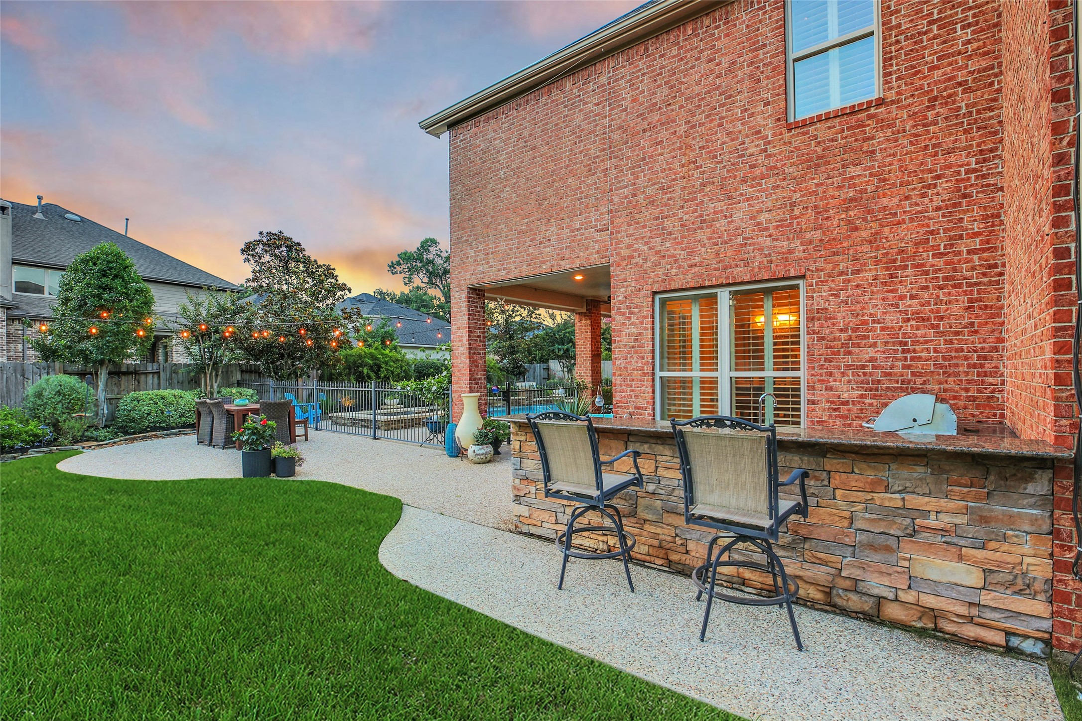 5902 Royal Hill Court Kingwood, TX 77345 - Photo 39 of 43 a building outdoor space with patio furniture and garden
