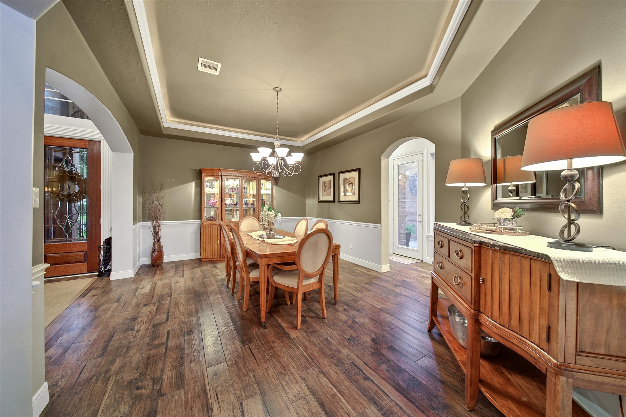 5902 Royal Hill Court Kingwood, TX 77345 - Photo 9 of 43 a view of a dining room with furniture window and wooden floor