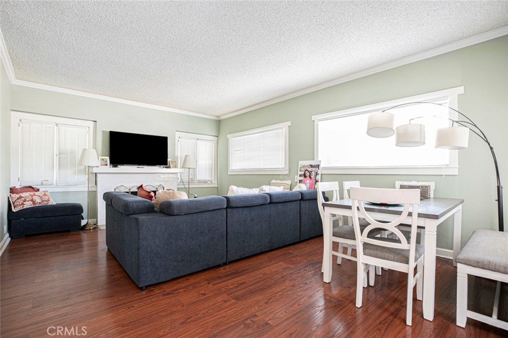 408 East Del Mar Boulevard Pasadena, CA 91101 - Photo 7 of 19 a living room with furniture and a flat screen tv