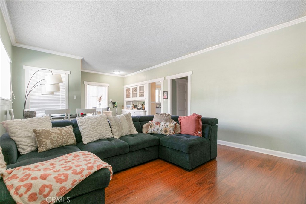 408 East Del Mar Boulevard Pasadena, CA 91101 - Photo 9 of 19 a living room with furniture and a wooden floor