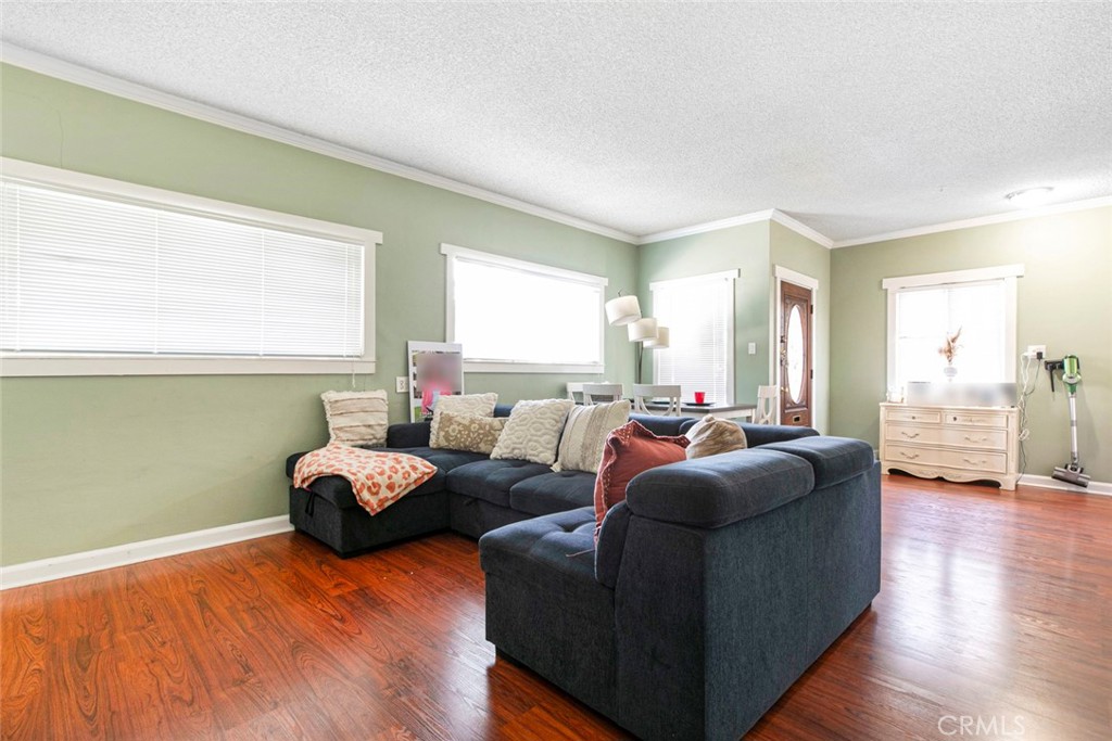 408 East Del Mar Boulevard Pasadena, CA 91101 - Photo 10 of 19 a living room with furniture and a wooden floor