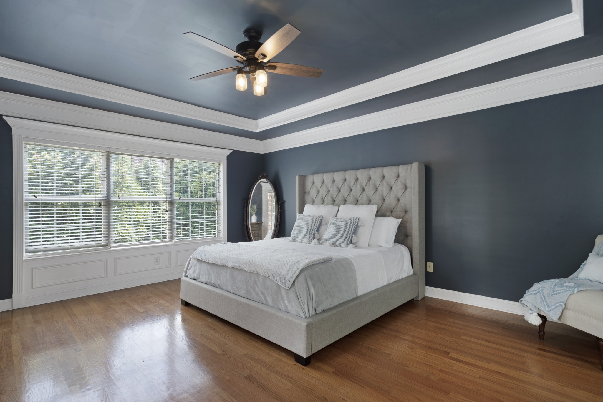 2003 Bathurst Court Spring Hill, TN 37174 - Photo 12 of 30 a large bedroom with a bed and a large window with wooden floor