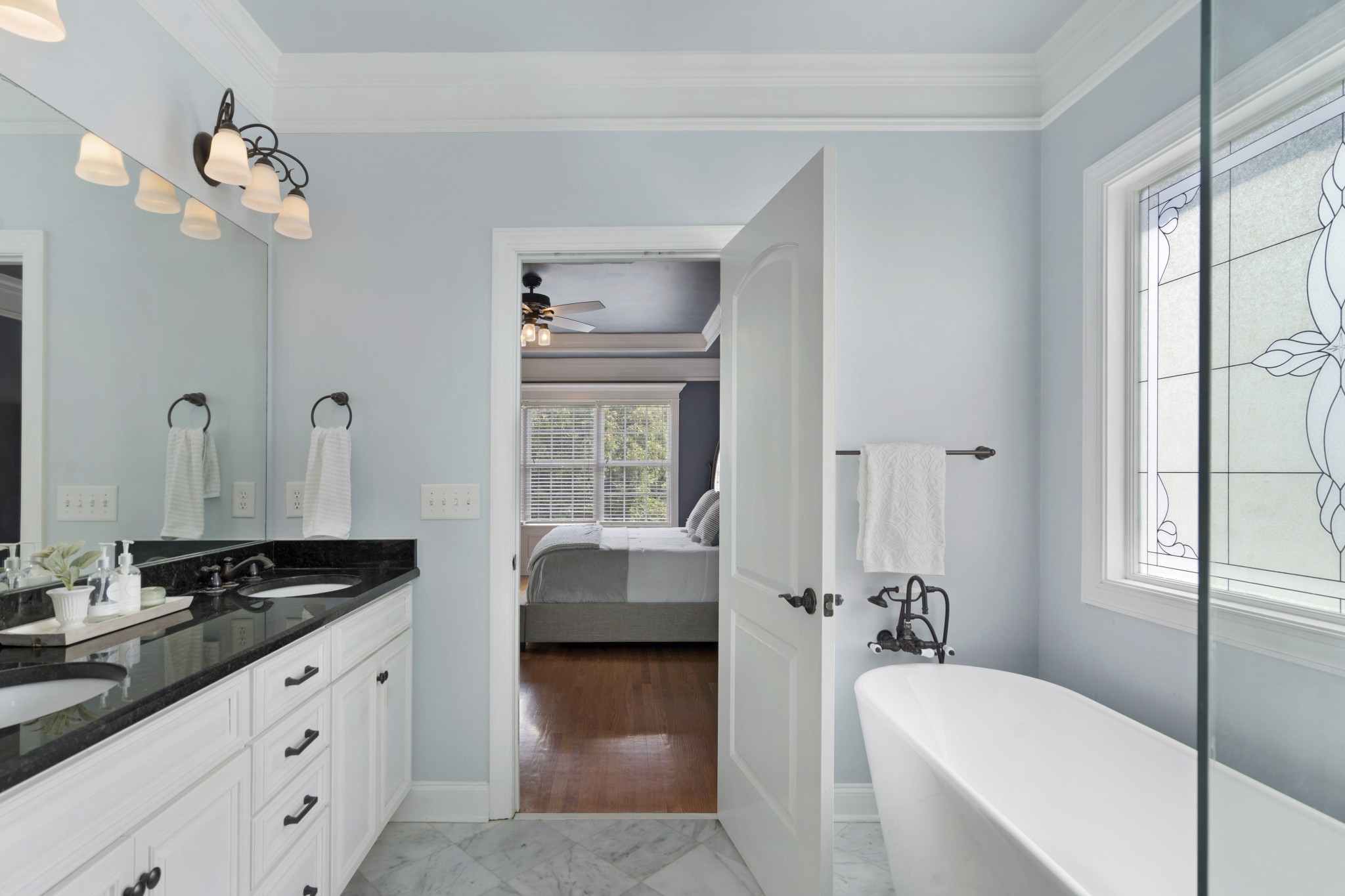 2003 Bathurst Court Spring Hill, TN 37174 - Photo 15 of 30 a bathroom with a tub sink double vanity and window