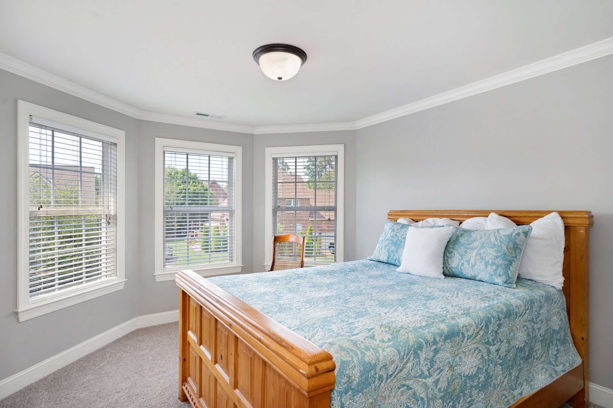 2003 Bathurst Court Spring Hill, TN 37174 - Photo 22 of 30 a bedroom with a large bed and a large window