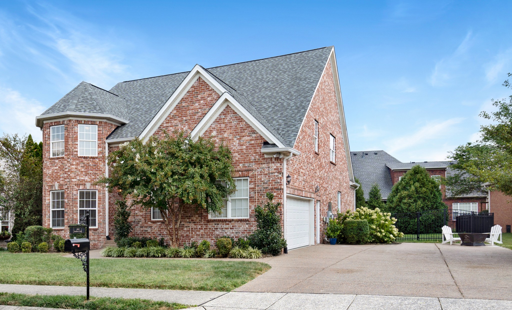 2003 Bathurst Court Spring Hill, TN 37174 - Photo 24 of 30 a view of a white house next to a yard
