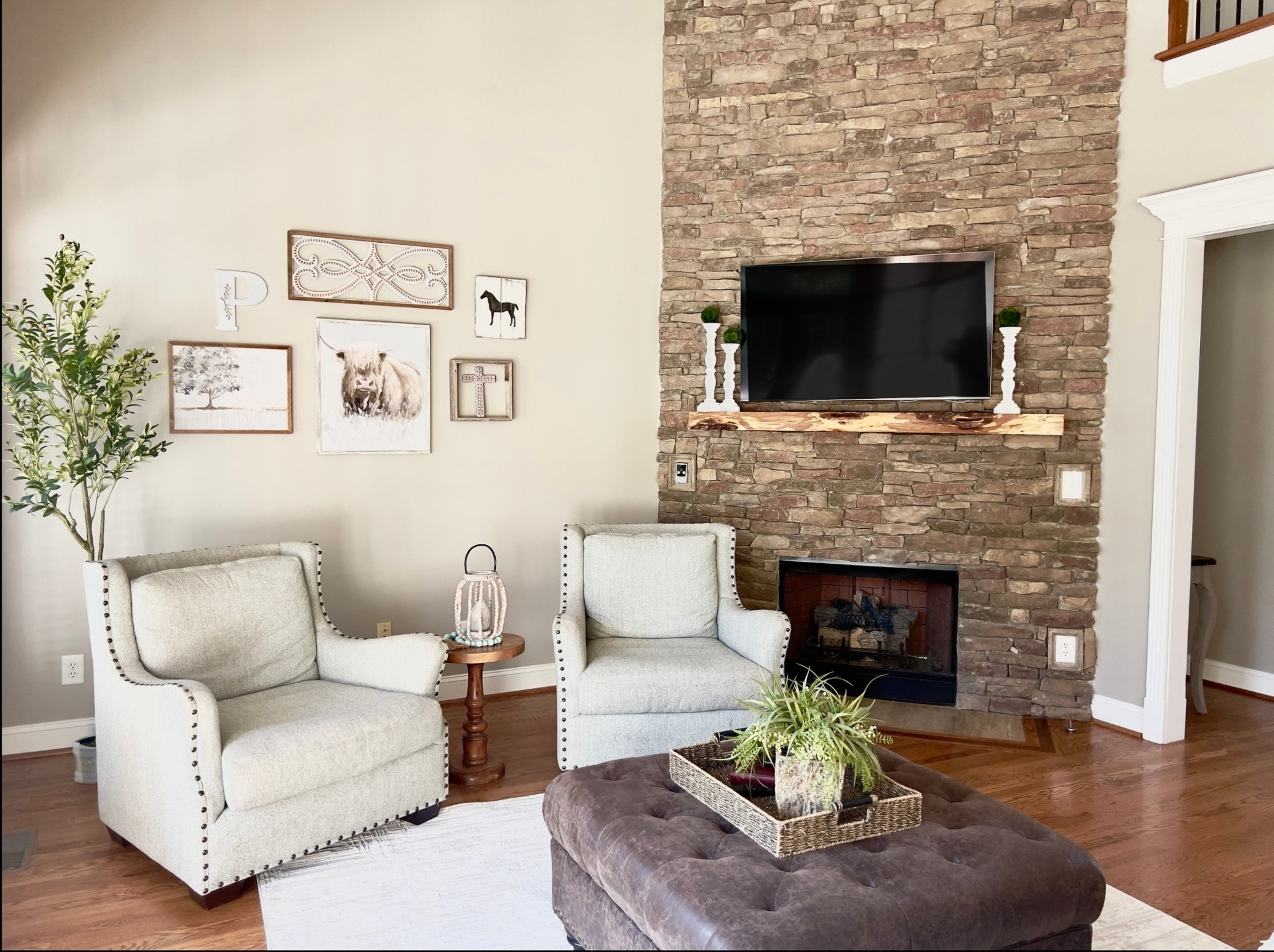 2003 Bathurst Court Spring Hill, TN 37174 - Photo 6 of 30 a living room with furniture a fireplace and a flat screen tv