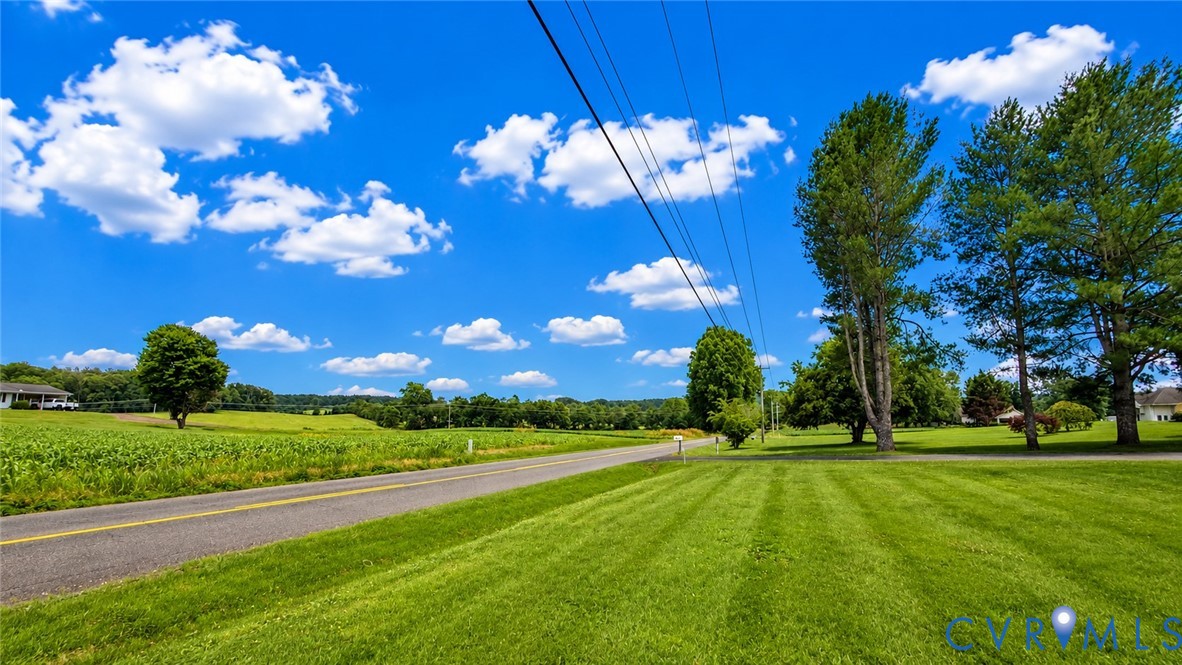 5560 West Hoover Road Reva, VA 22735 - Photo 15 of 32 Expansive green space featuring a paved road, matu