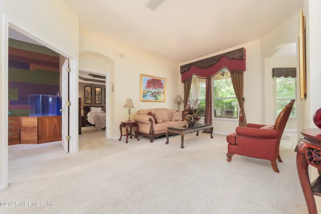 a view of a dining room with furniture window and outside view