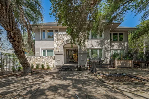 a front view of a house with yard