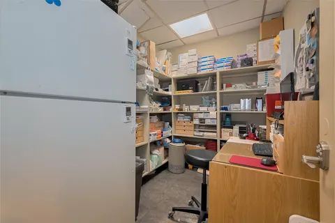 a storage room with washer and dryer