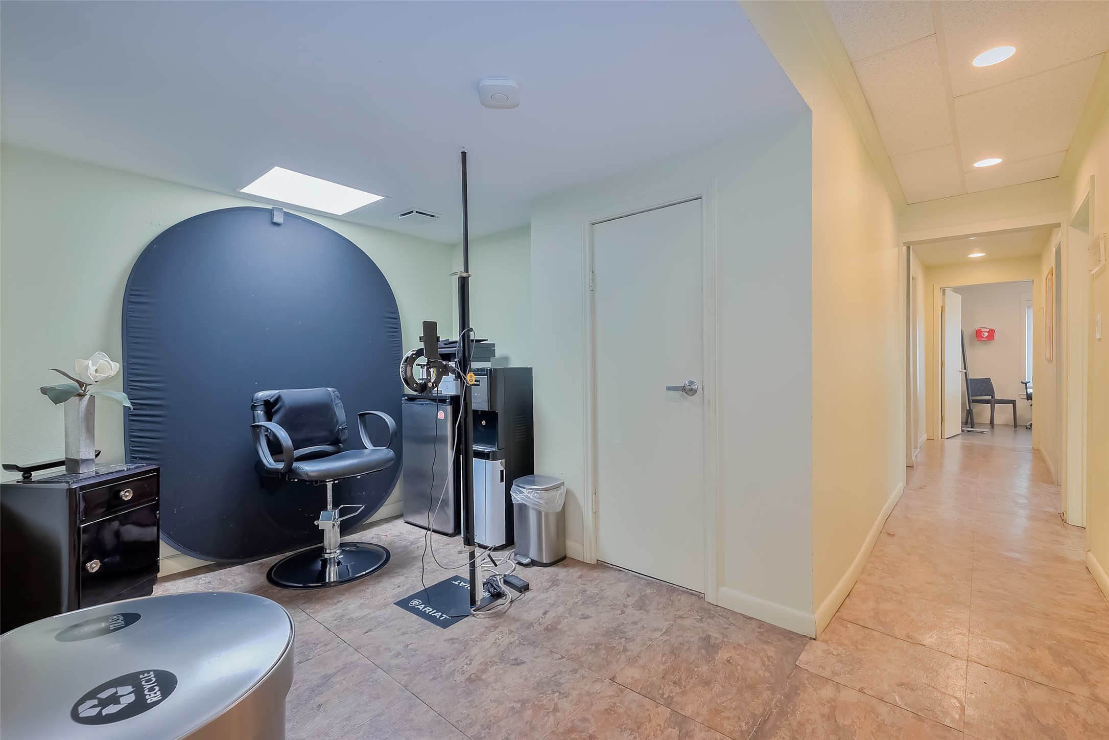 1512 West Alabama Street Houston, TX 77006 - Photo 15 of 32 a view of a workspace with furniture and a window