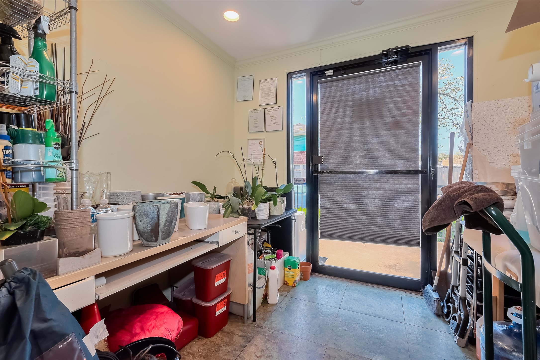 1512 West Alabama Street Houston, TX 77006 - Photo 17 of 32 a bedroom with furniture and a potted plant
