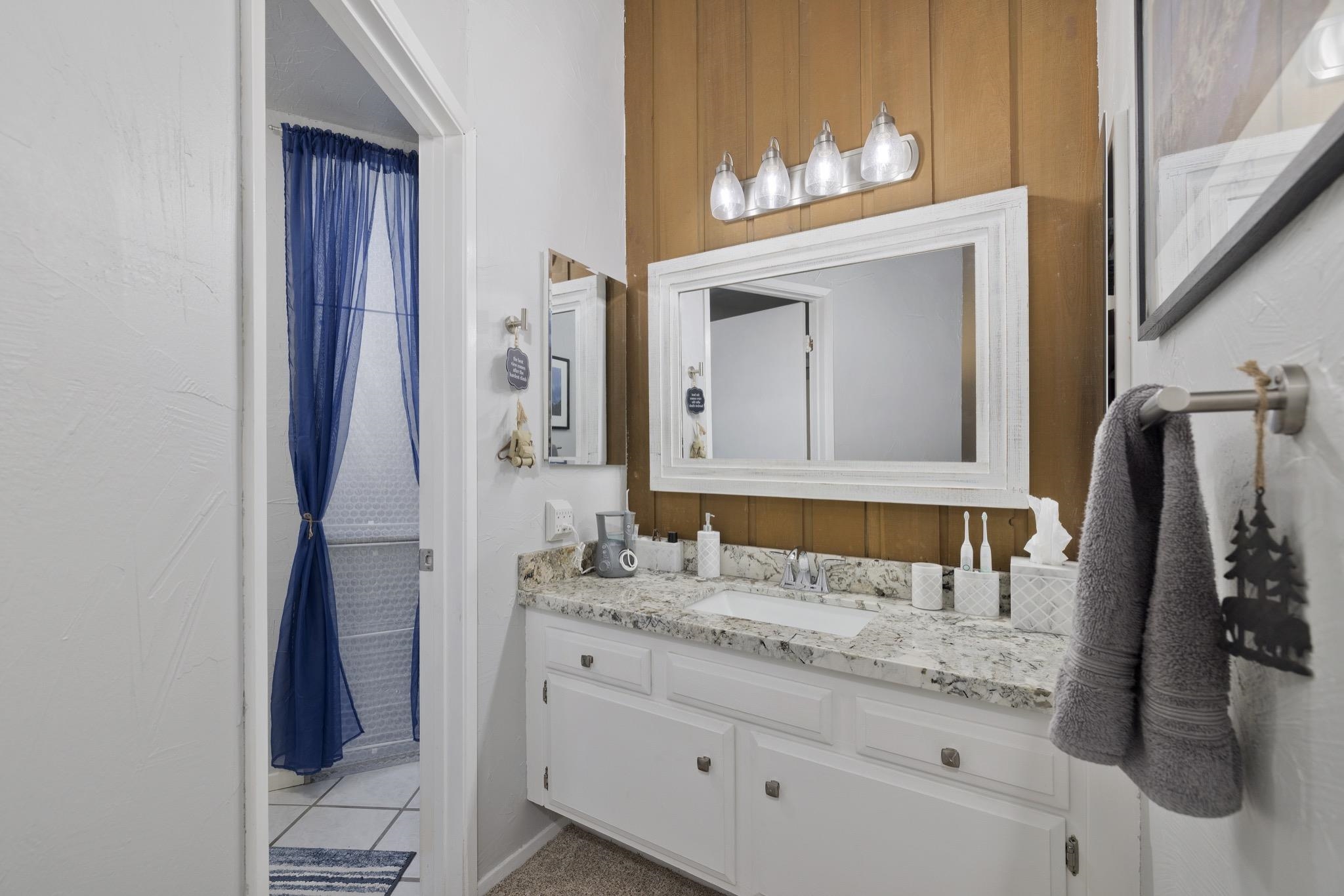 286 Old Mammoth Road, Unit 37 Mammoth Lakes, CA 93546 - Photo 19 of 33 Bathroom featuring vanity and light tile patterned flooring