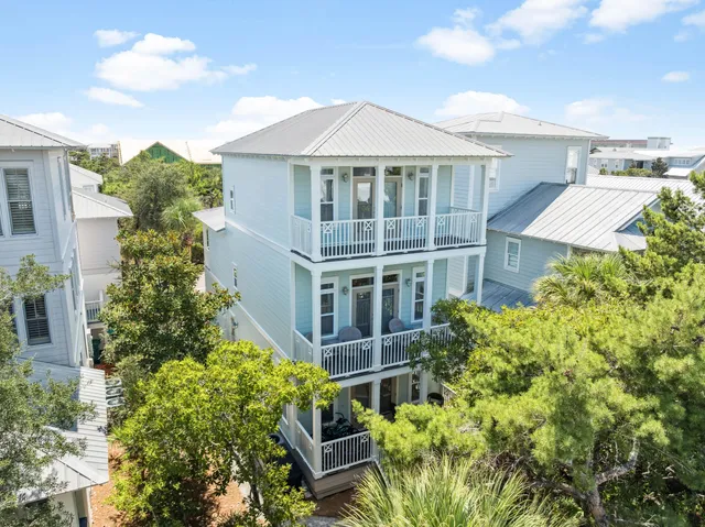 front view of a house with a garden