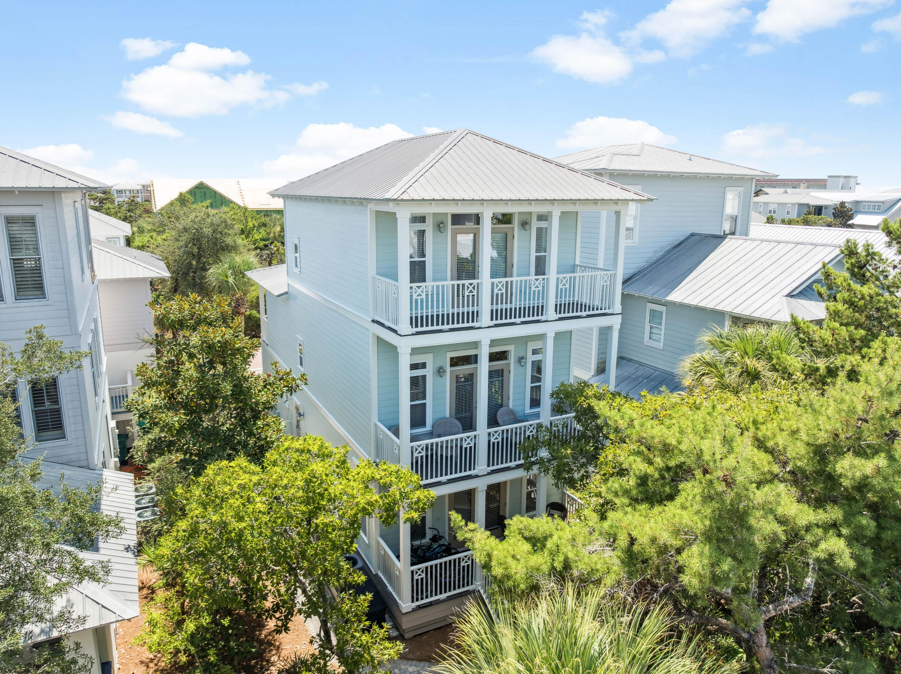 front view of a house with a garden