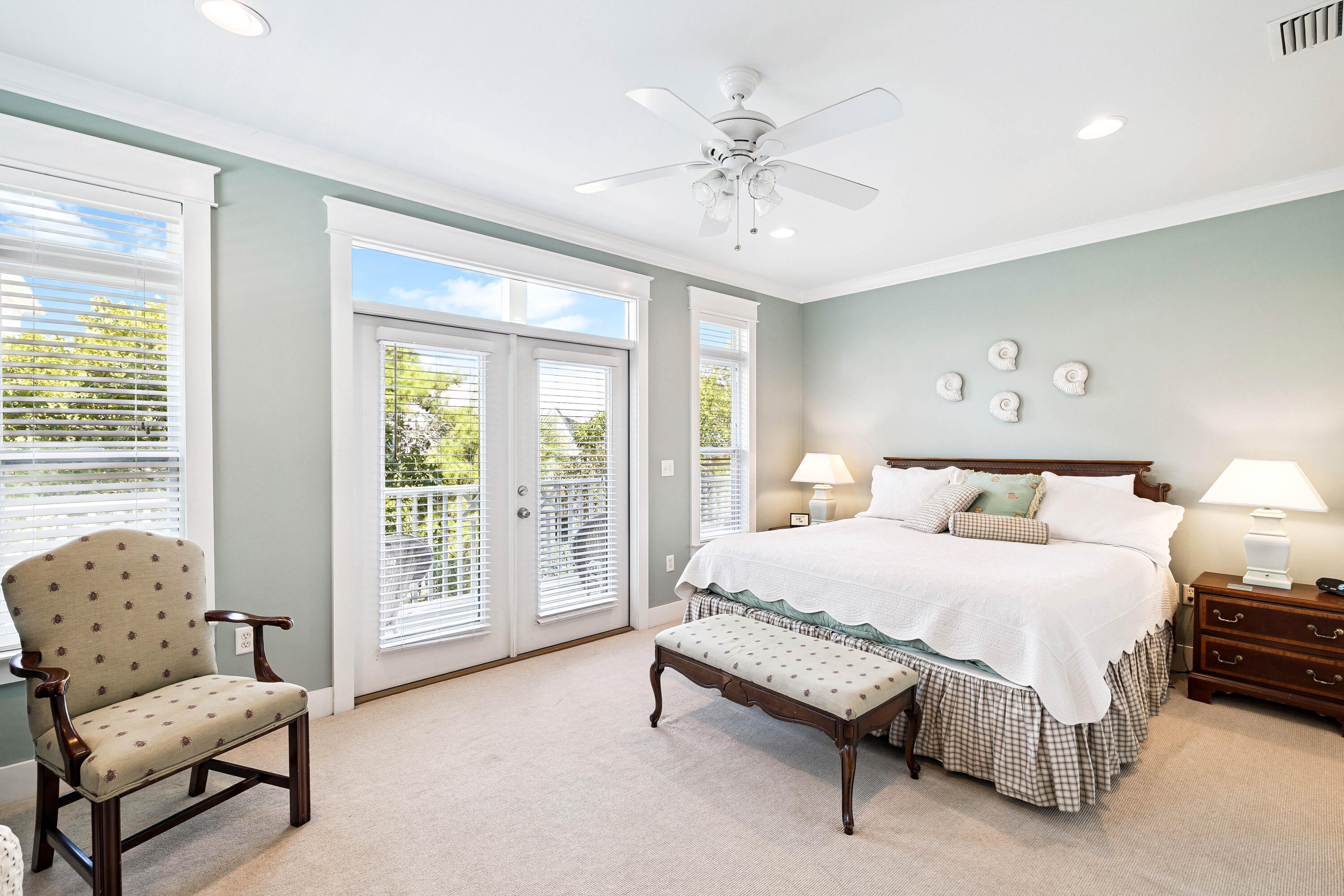 54 Surfer Lane Seacrest, FL 32461 - Photo 26 of 47 a spacious bedroom with a bed and a chandelier