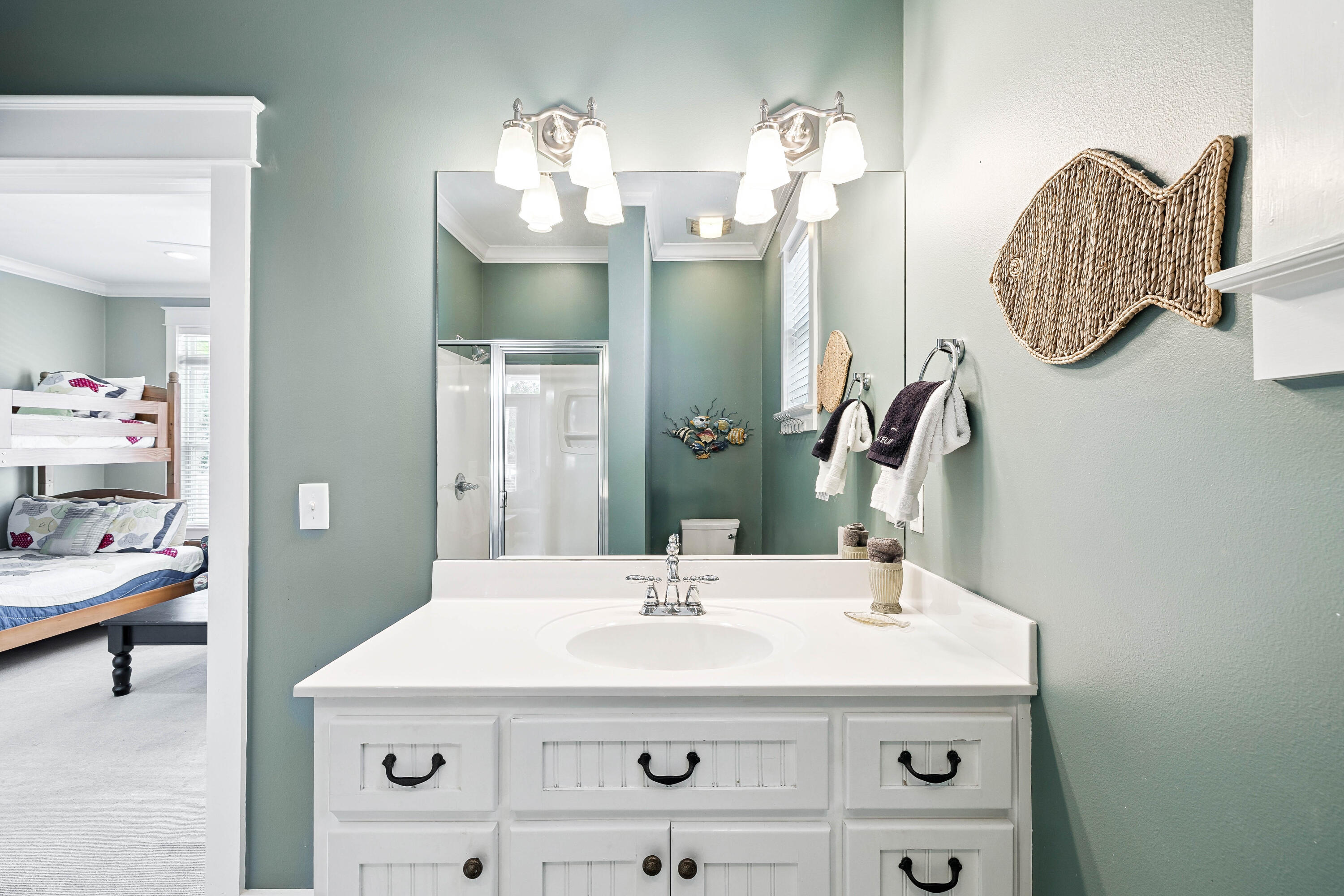 54 Surfer Lane Seacrest, FL 32461 - Photo 34 of 47 a bathroom with a sink and a mirror