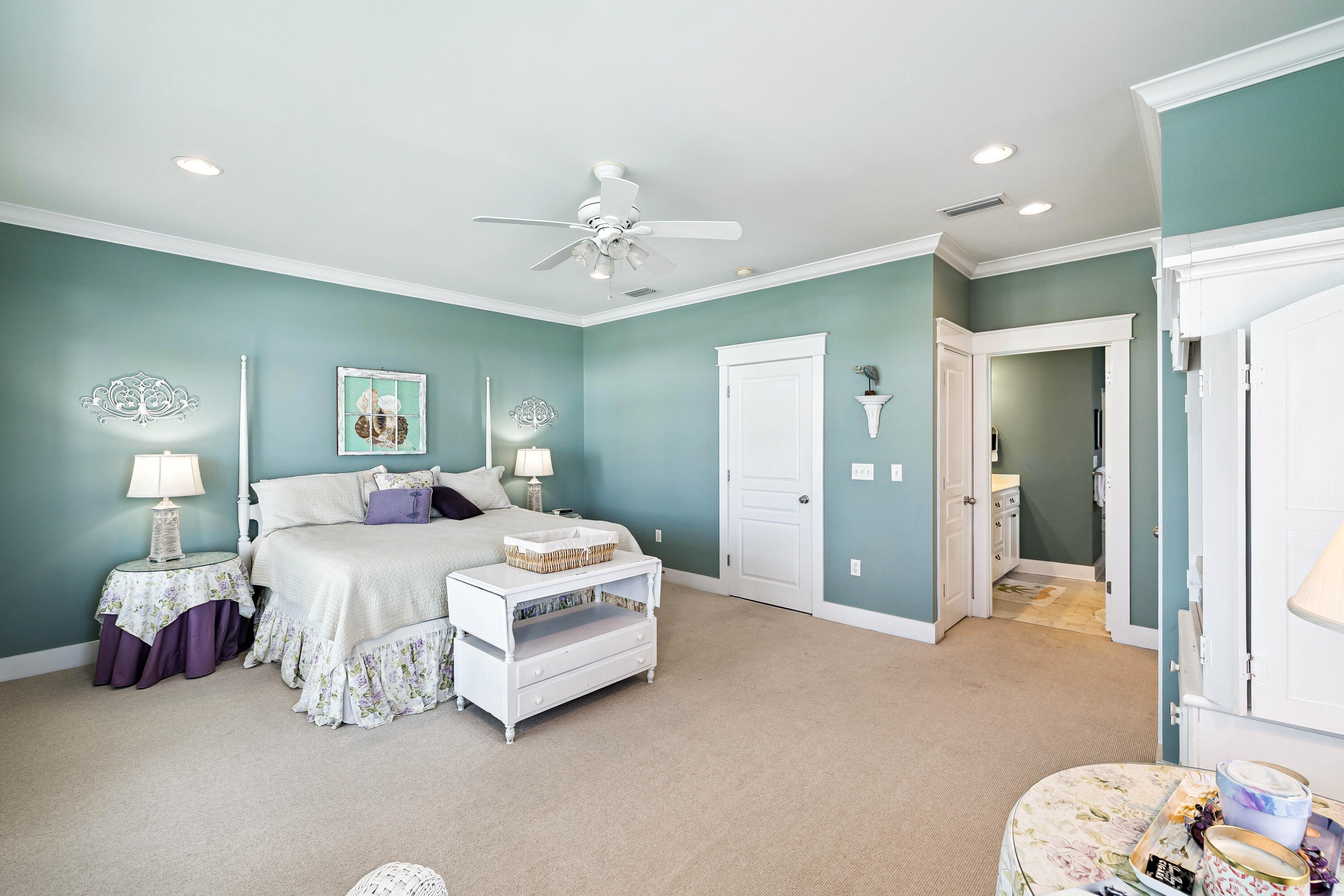 54 Surfer Lane Seacrest, FL 32461 - Photo 38 of 47 a spacious bedroom with a bed and a chandelier