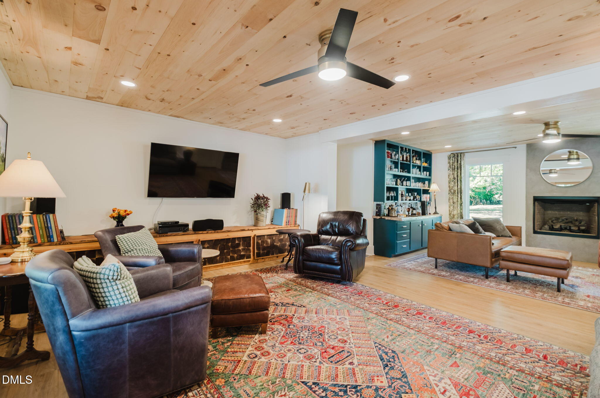 370 Robinson Ferry Road Macon, NC 27551 - Photo 27 of 85 a living room with furniture and a flat screen tv