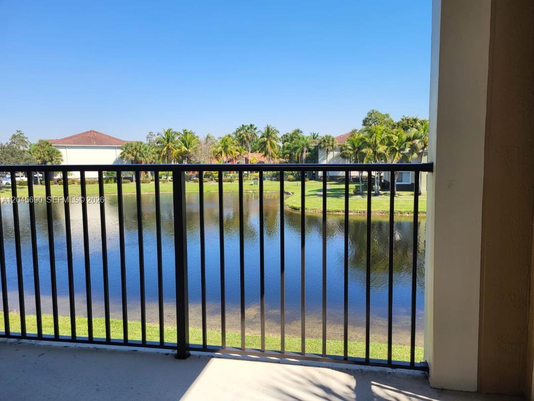 8070 North Nob Hill Road, Unit 208 Tamarac, FL 33321 - Photo 1 of 16 a view of a balcony